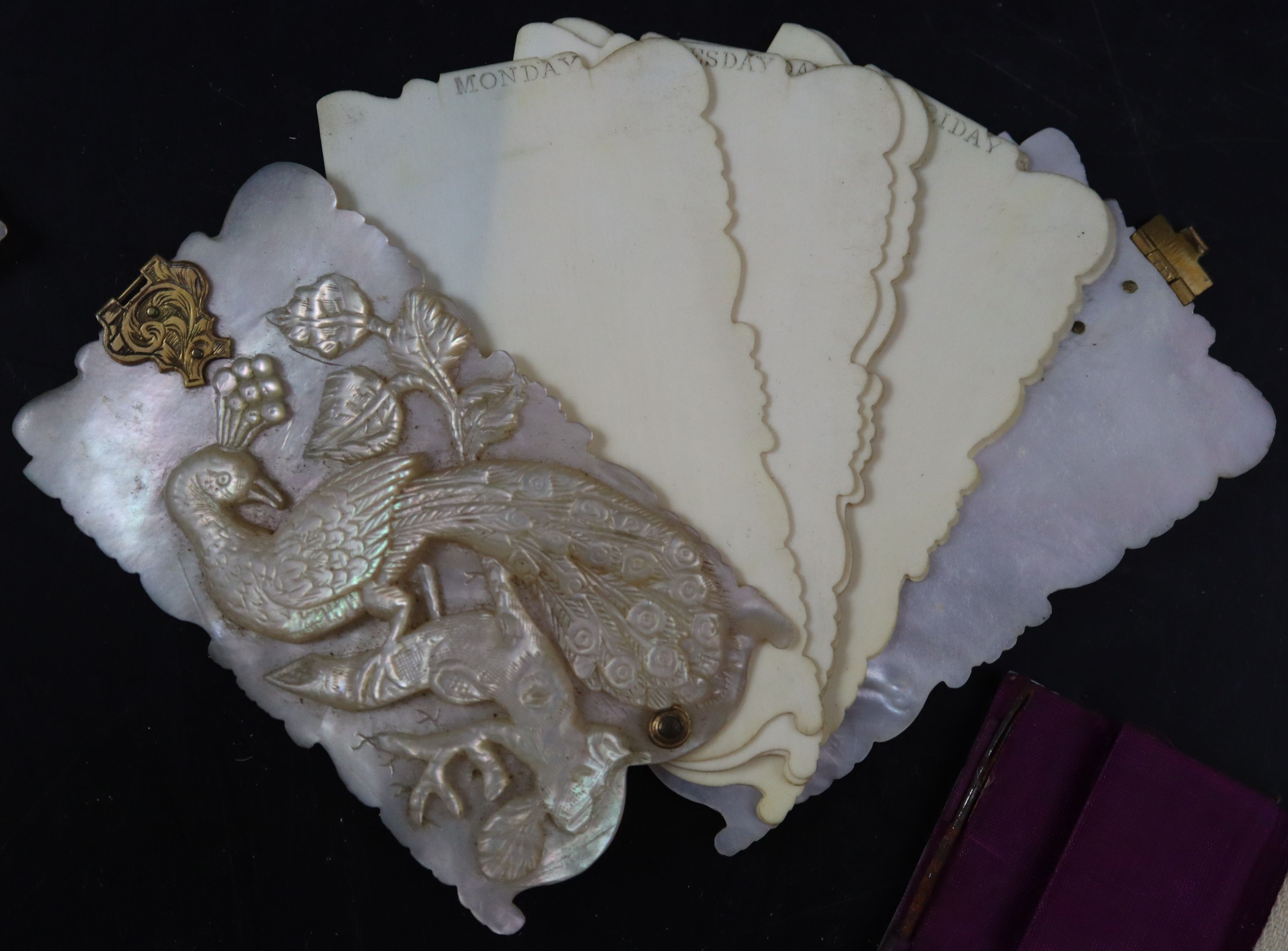 A collection of 19th century Palais Royale mother of pearl note cases and dance cards, largest 9cm (7)